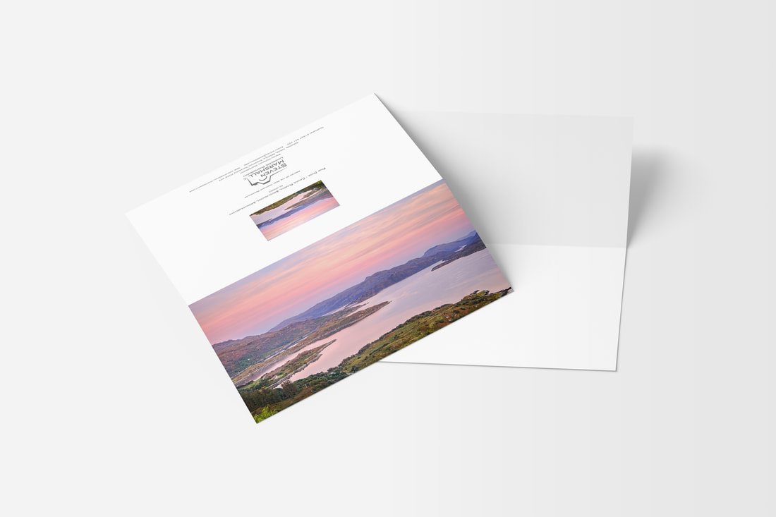A DL sized greeting card featuring the view of Loch Sunart at dusk from high up on the hill above Camas Fearna, Port Na Croisg and Glenmore Bay with the sky and see lit pink | Ardnamurchan Scotland