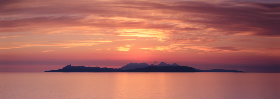 A summer sunset over the Small Isles of Eigg and Rum viewed from Smirisary | Steven Marshall Photography