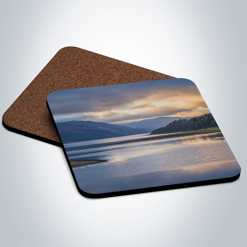 Souvenir photo coaster featuring an image of view of Loch Sunart from Strontian on a December afternoon with sun breaking through the clouds | Sunart Scotland