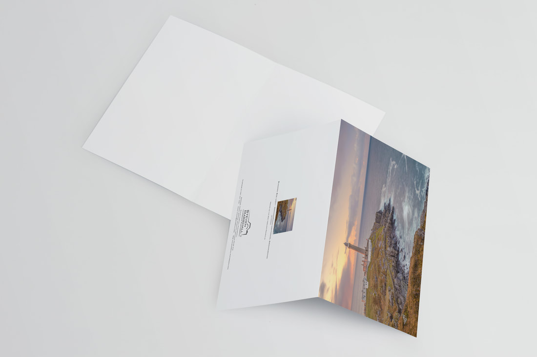 An A5 greeting card featuring Ardnamurchan Lighthouse on a blustery afternoon with light from the setting sun falling on its side and waves crashing on the rocks beneath it | Ardnamurchan Scotland