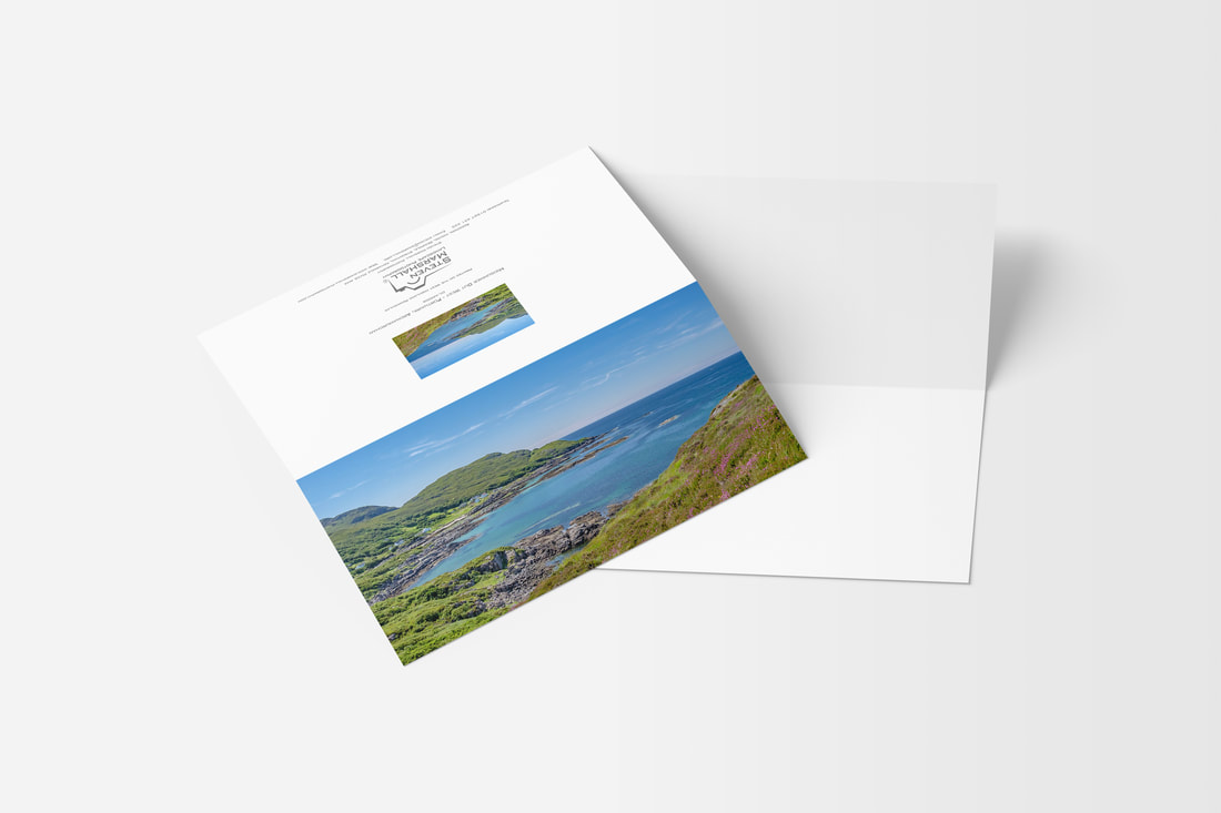 A DL sized greeting featuring the view of Portuairk, looking from the hills between it and Sanna, across blue seas and under blue skies | Ardnamurchan Scotland
