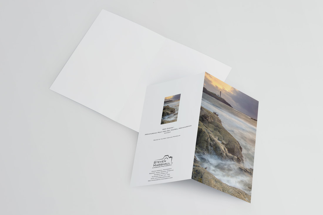 An A6 greeting card featuring a sunset out on the rocks at Bay MacNeil with Ardnamurchan Lighthouse standing proud on the horizon to mark the most westerly point of the British Mainland | Ardnamurchan Scotland