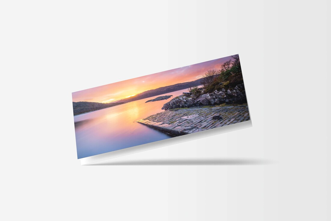 A DL sized greeting card featuring a sunrise on a January Morning with a high tide at the Salen Jetty | Ardnamurchan Scotland
