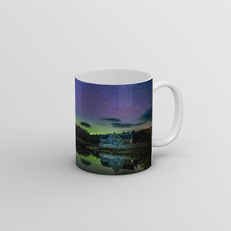 Souvenir photo mug featuring an image of the Northern Lights above the old boathouse by the side of Loch Aline on Ardtornish Estate | Morvern Scotland