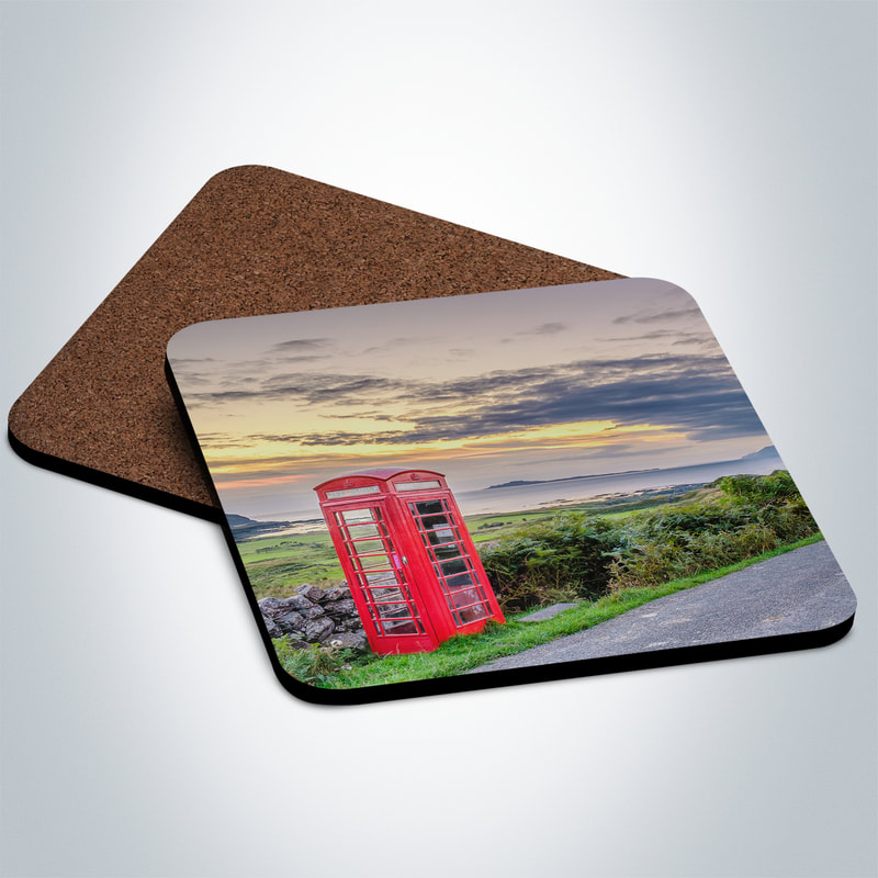 Souvenir photo coaster featuring an image of the red phone box at Kilmory with the north coast of Ardnamurchan and the Small Isles of Muck, Rùm and Eigg in the background | Ardnamurchan Scotland