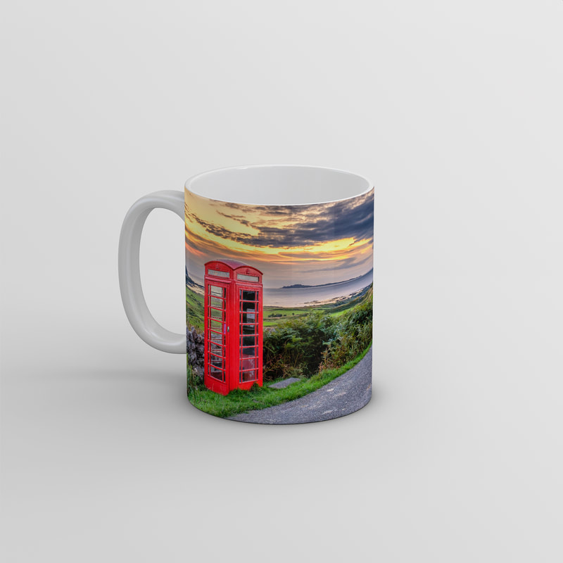 Souvenir photo mug featuring an image of the red phone box at Kilmory with the north coast of Ardnamurchan and the Small Isles of Muck, Rùm and Eigg in the background | Ardnamurchan Scotland