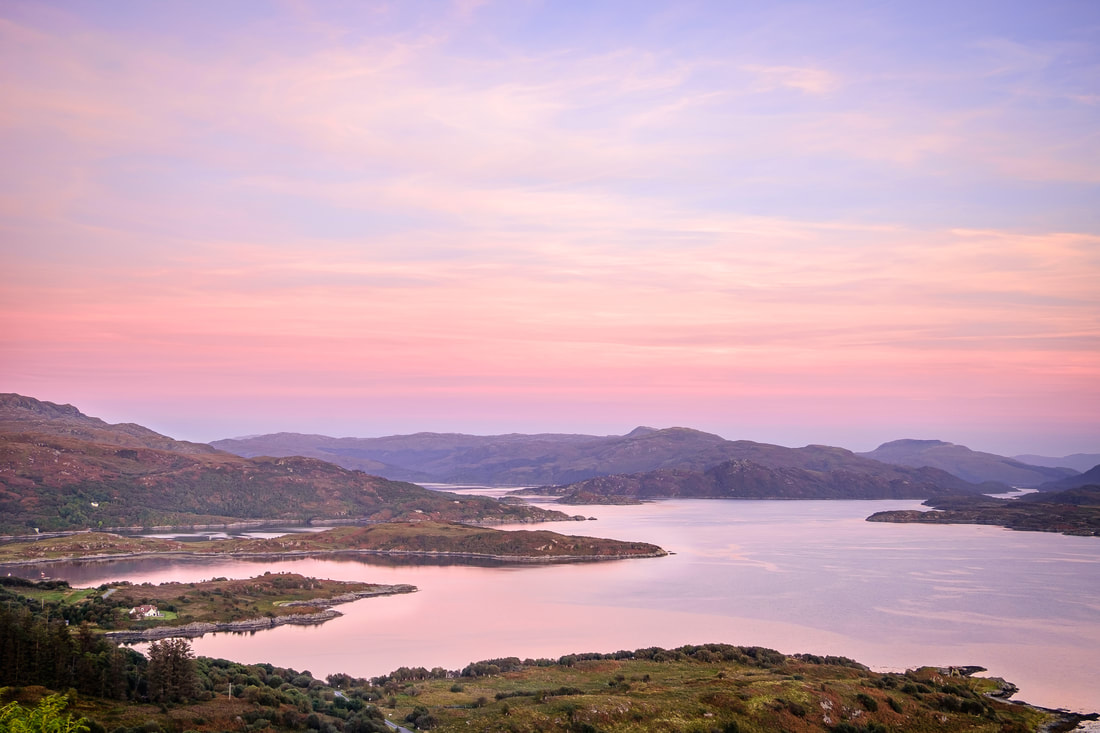 Looking over Loch Sunart, Camas Fearna, Port Na Croisg and Glenmore Bay under the pink sky of dusk | Ardnamurchan Scotland | Steven Marshall Photography