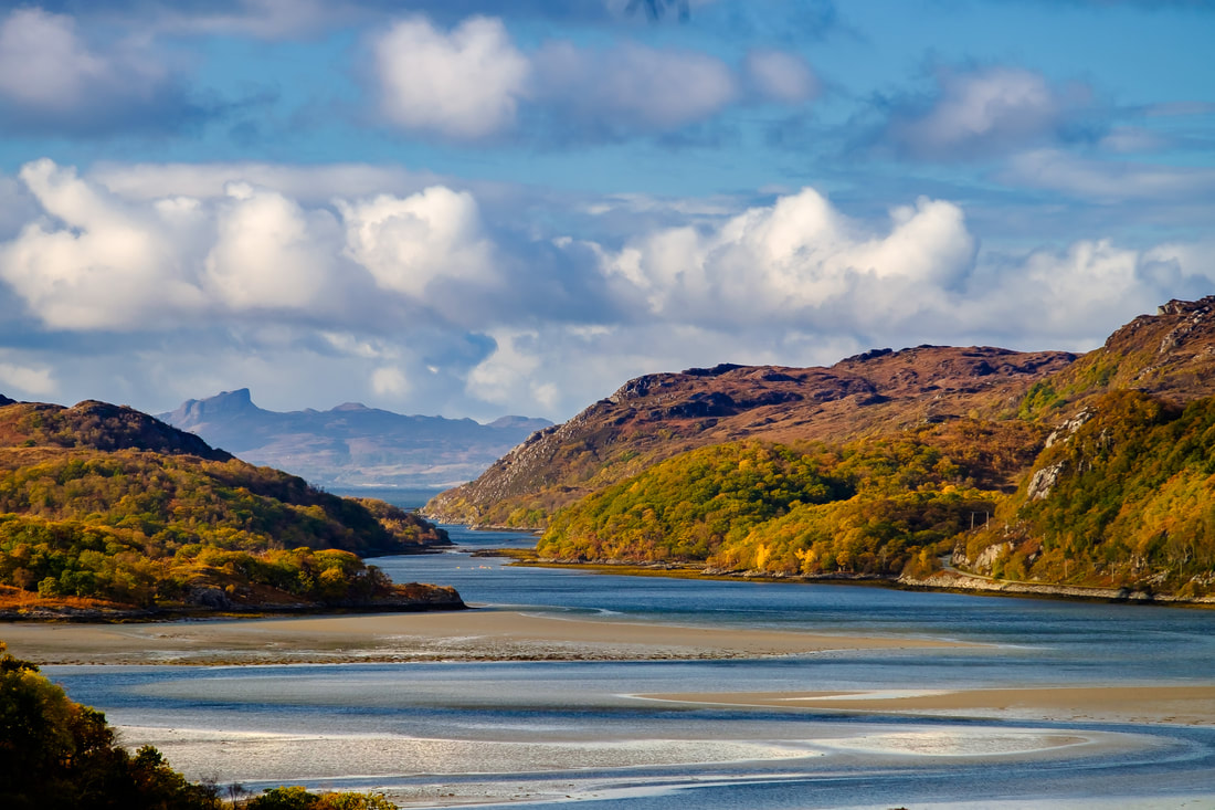 The North Channel of Loch Moidart at low tide with the sandbanks revealed and the River Moidart meandering through them | Moidart Scotland