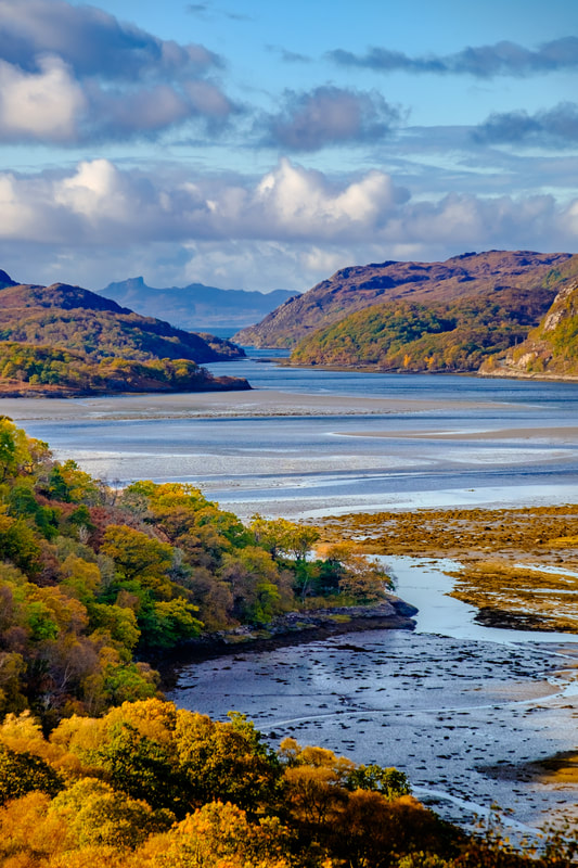 The North Channel of Loch Moidart on an autumn afternoon with the trees on the hills around it showing the autumn colours | Moidart Scotland