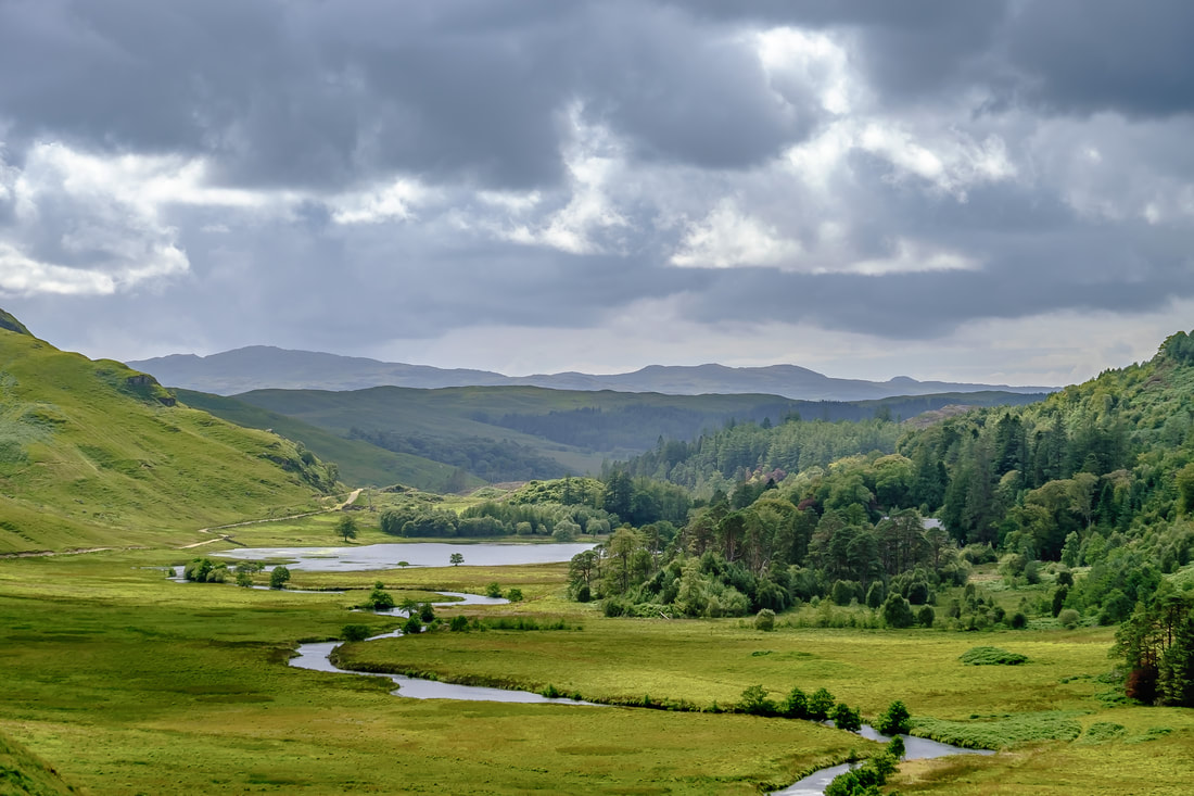 The River Moidart winding its way through verdant green Glen Moidart | Moidart Scotland
