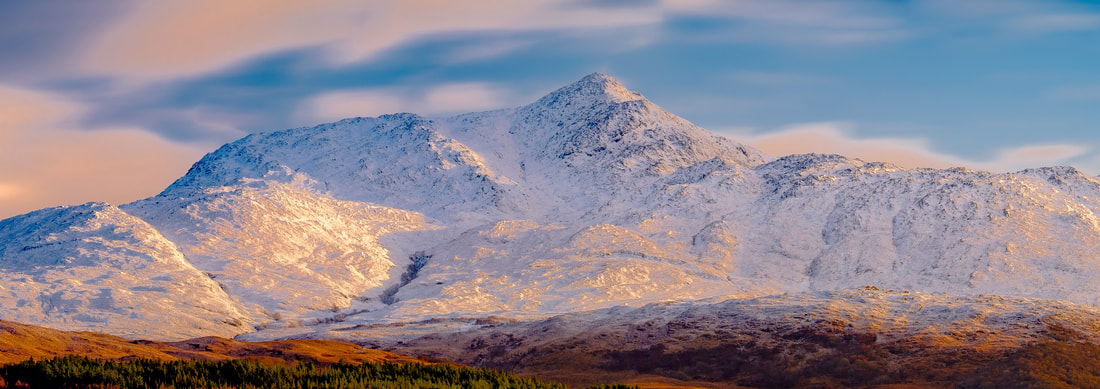 Ben Resipole under a fresh fall of early winter snow and the first light of the day | Sunart Scotland