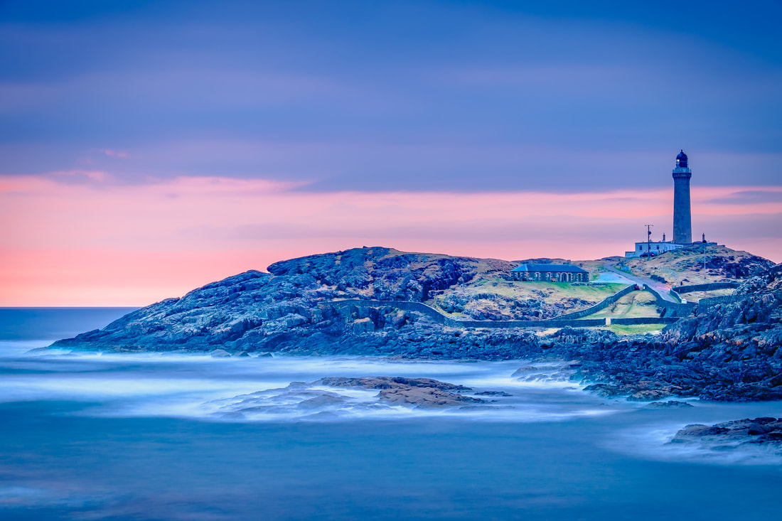 Ardnamurchan Lighthouse at dusk against a background of blues and pinks | Ardnamurchan Scotland