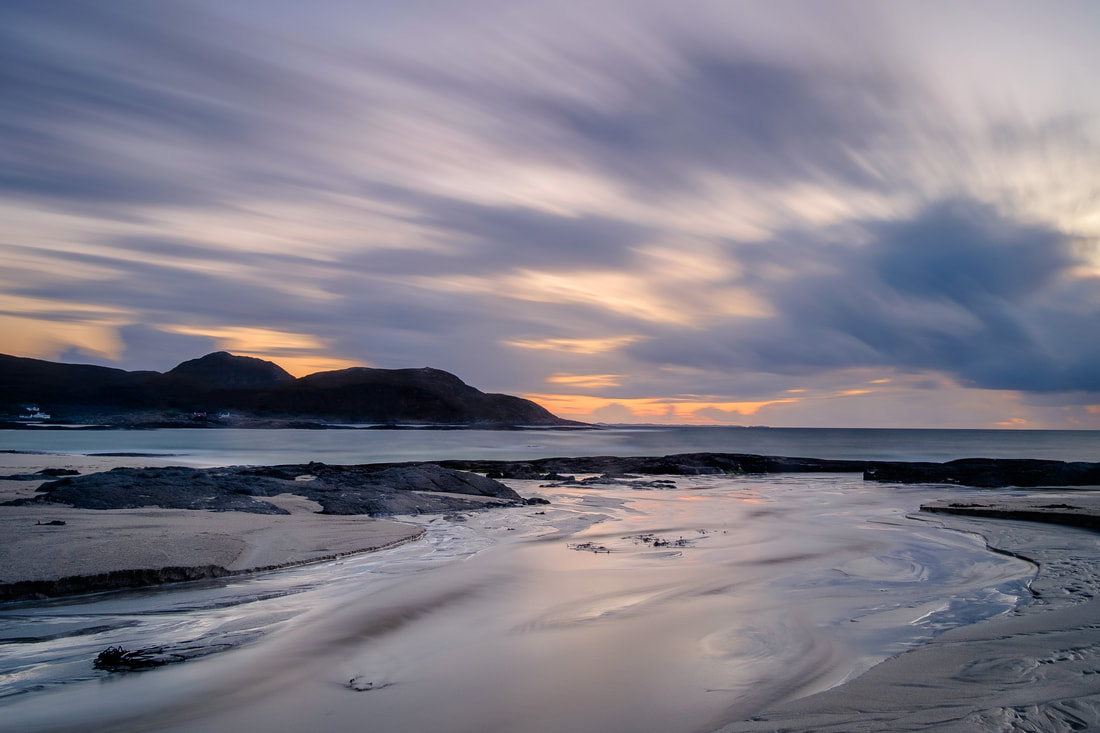 A weather front approaching Sanna Bay from the west bringing dark clouds with it | Ardnamurchan Scotland