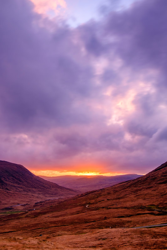 Gleann Dubh, the Black Glen, viewed from Taobh Dubh with the sun setting behind the hills beyond it | Morvern Scotland