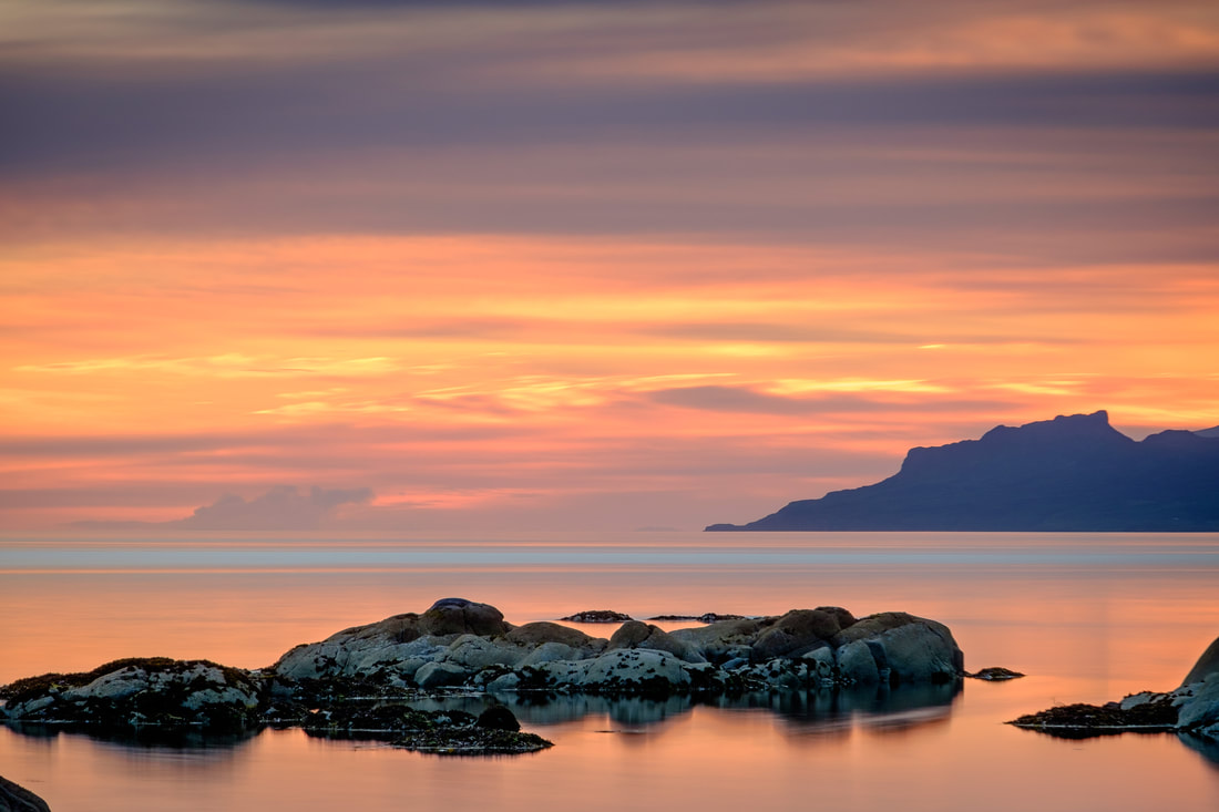 The Isle of Eigg viewed from Ardtoe with a pastel-coloured sea and sky | Ardnamurchan Scotland | Steven Marshall Photography