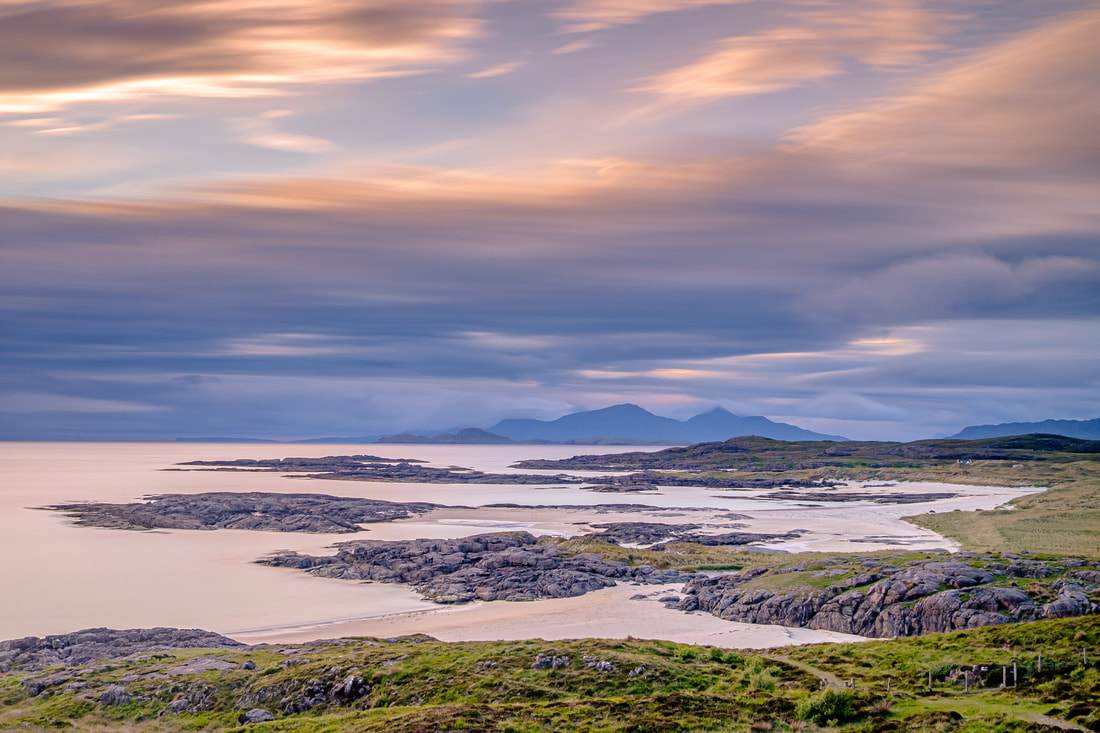 Cloud rolling in from the North over Sanna Bay with the colours of sunset in the sky | Ardnamurchan Scotland