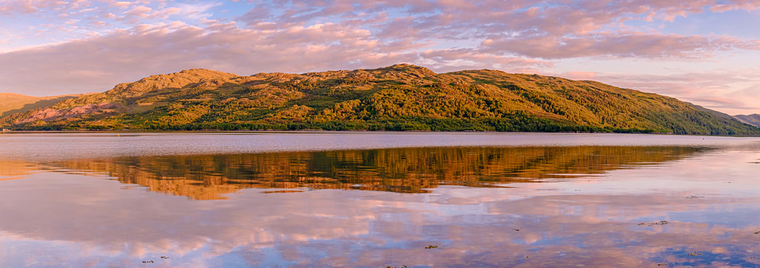 Sunset over Loch Sunart at Resipole on the Summer Solstice with a pink sky over the hills of Morvern | Sunart Scotland