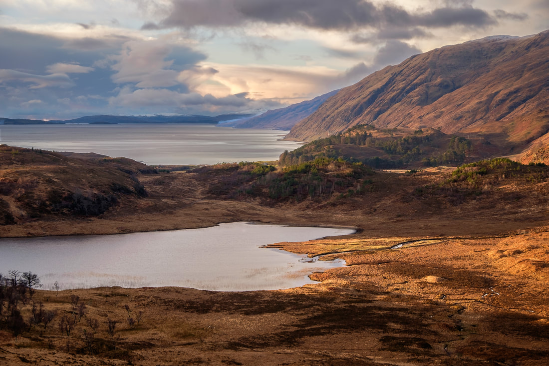 Golden morning light on the eastern coastline of Ardgour looking down from Torr an Fhiuch towards Kingairloch | Ardgour Scotland
