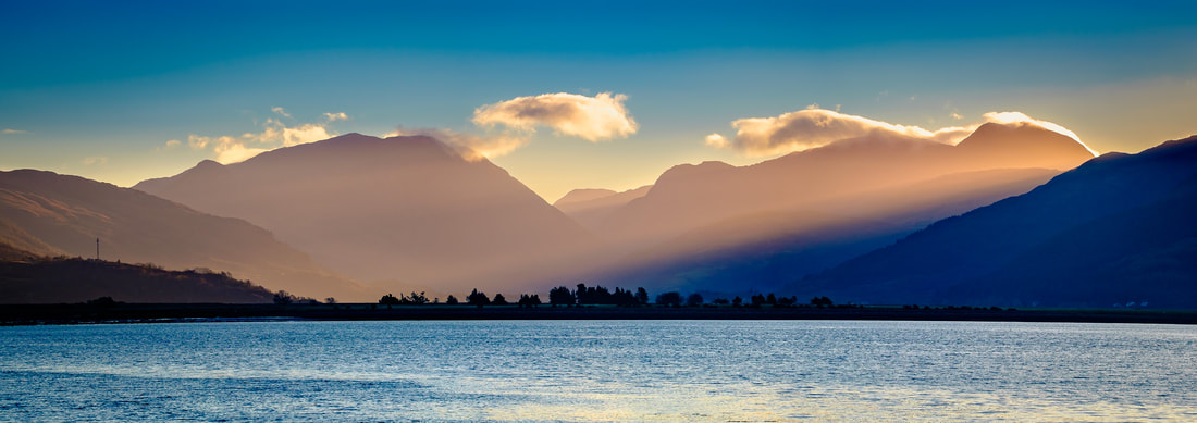 View over Loch Linnhe from Sallachan with sun rising over the mountains of Glencoe | Ardgour Landscape