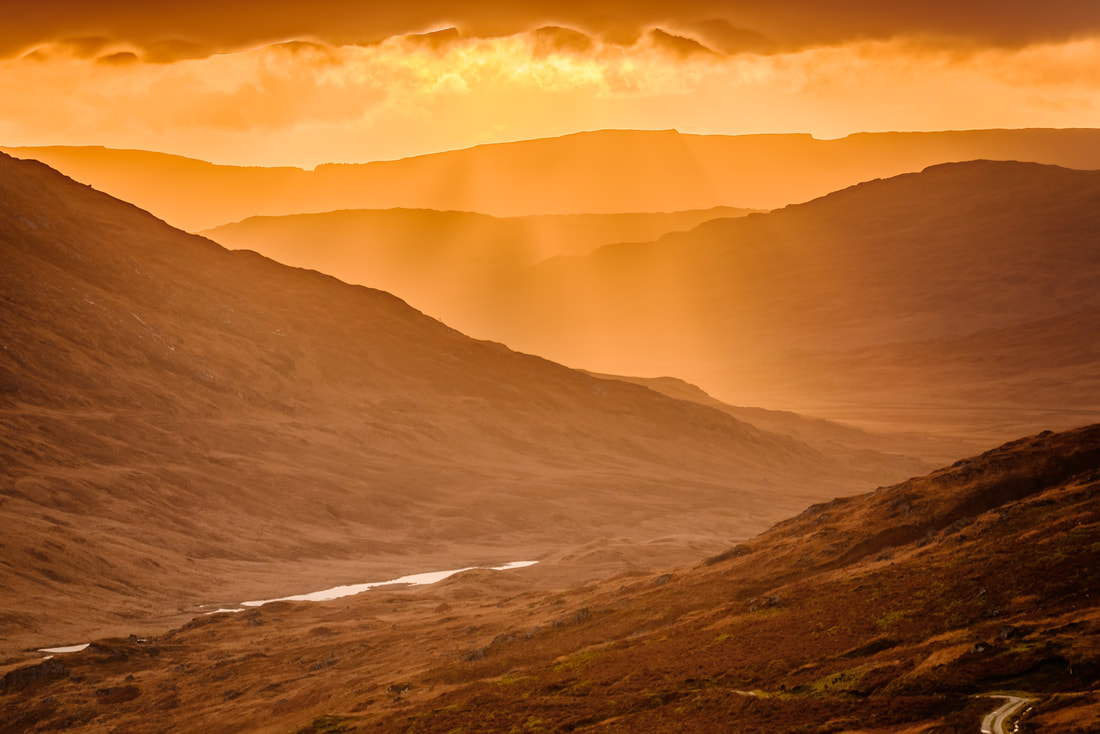 Gleann Dubh, the Black Glen, viewed from the slopes of Taobh Dubh and filled with gold light from the setting sun | Morvern Scotland