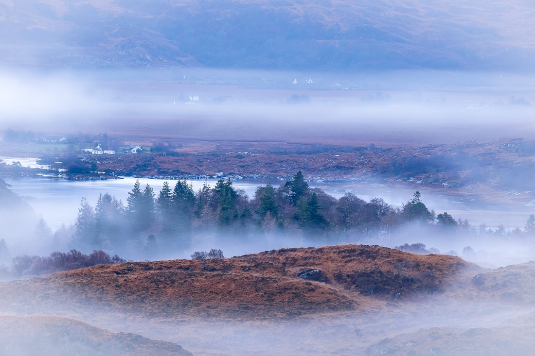 Eilean Shona and Shielfoot appearing from the morning mist as it clears from the hills around Loch Moidart | Moidart Scotland