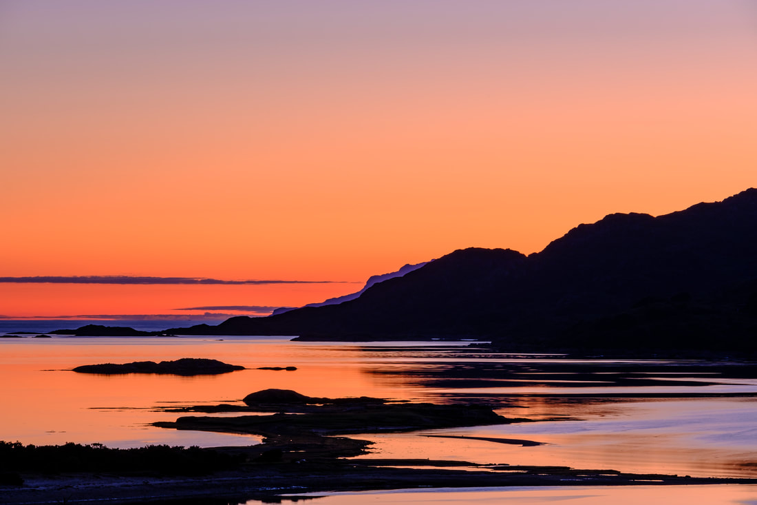 Intense midsummer sunset with the view of the South Channel of Loch Moidart from Dorlin | Moidart Scotland