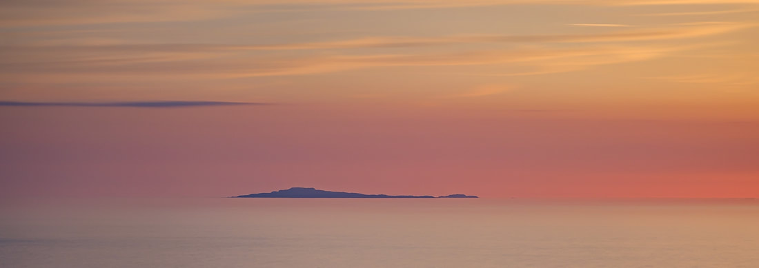 A summer sunset over the Isle Eigg viewed from Smirisary, Moidart | Steven Marshall Photography