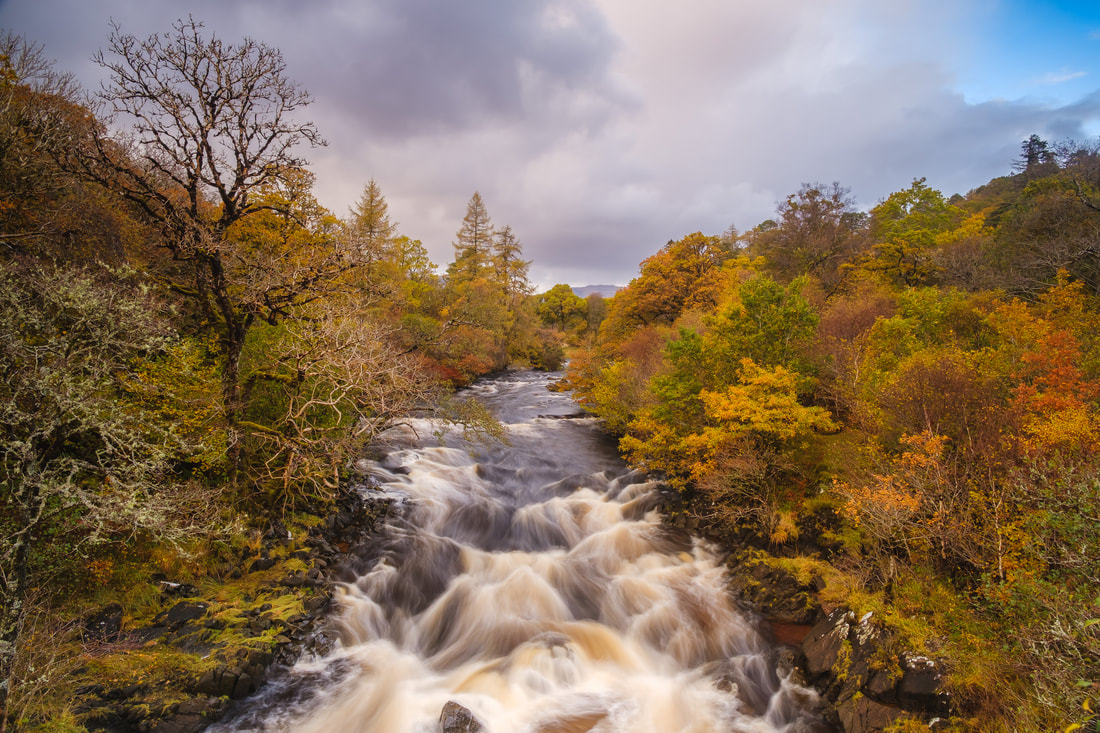 The River Aline in full spate following Autumn rain, flowing beneath the Ivy Bridge at Kinlochaline | Morvern Scotland | Steven Marshall Photography