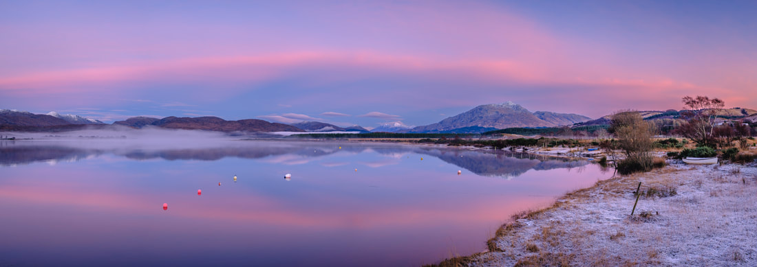 A gloriously pink dusk on a frosty day looking over Loch Shiel to a snow-capped Ben Resipole | Ardnamurchan Scotland