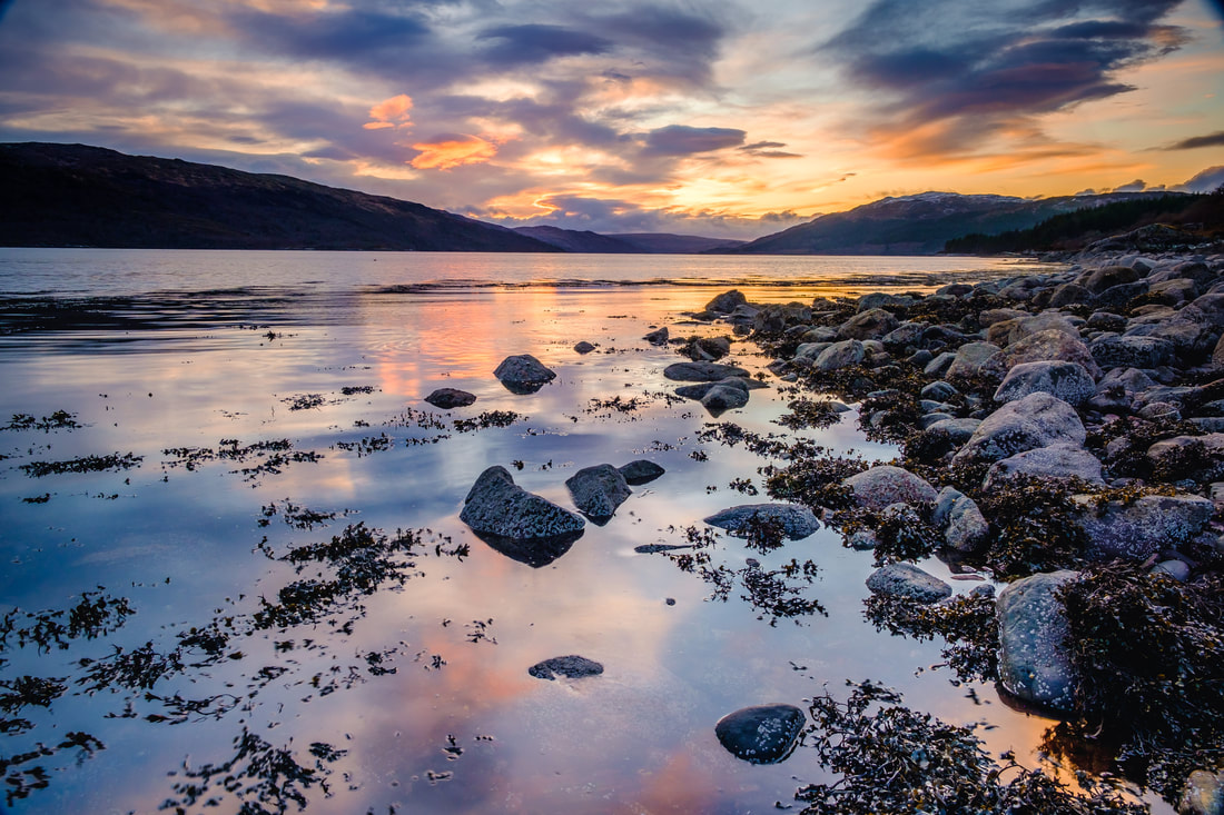 Sunset on the last day of 2020 with the sun going down behind the hills of Morvern across Loch Sunart from Resipole | Sunart Scotland