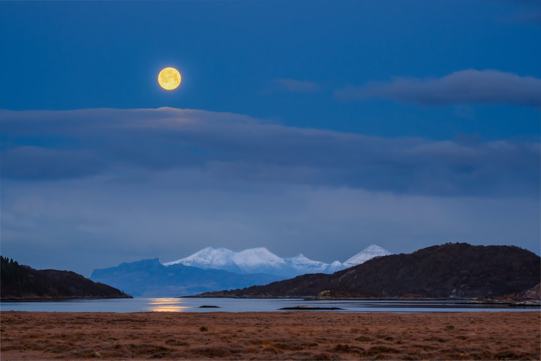 A full moon over the Small Isles of Eigg and Rum, viewed from Arivegaig, Ardnamurchan | Steven Marshall Photography