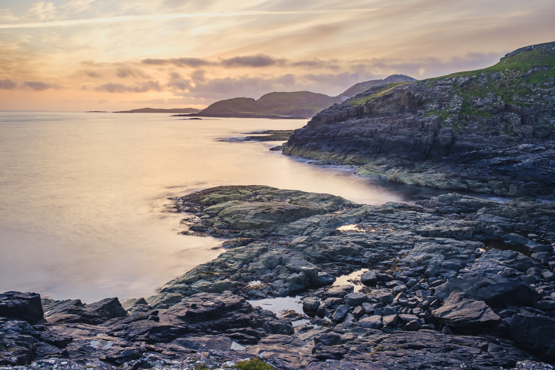 First light of a midsummer day bathing the rocky coastline on the north side of the Peninsula | Ardnamurchan Scotland | Steven Marshall Photography