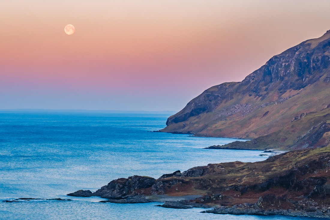A full moon setting out beyond Maclean’s Nose against a colourful sunrise sky | Ardnamurchan Scotland | Steven Marshall Photography