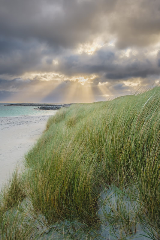 Storm clouds clearing over Sanna with marram grass on the sand dunes | Ardnamurchan Scotland | Steven Marshall Photography