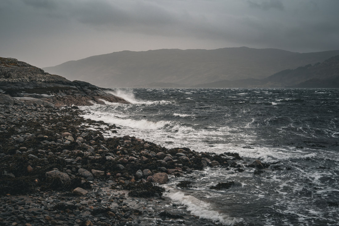 The rocky shore of Loch Sunart at Resipole with waves crashing on it during a storm | Sunart Scotland | Steven Marshall Photography