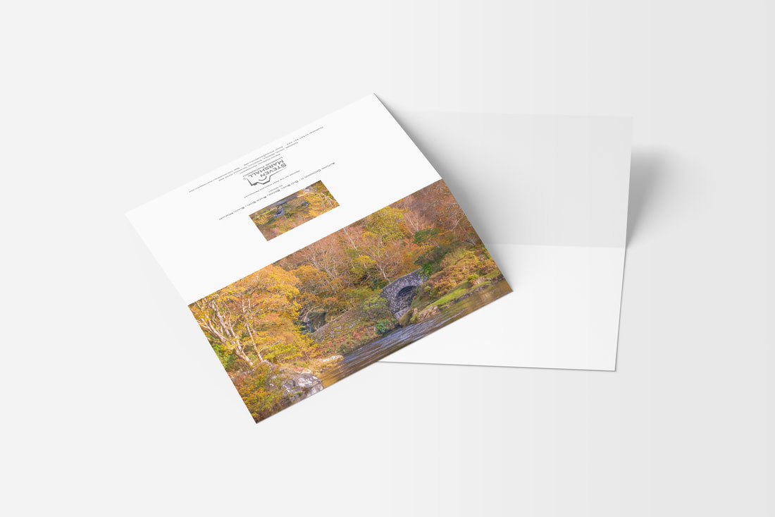 A DL sized greeting card featuring the old bridge over the River Shiel at autumn time with the trees in full autumn colours | Moidart Scotland