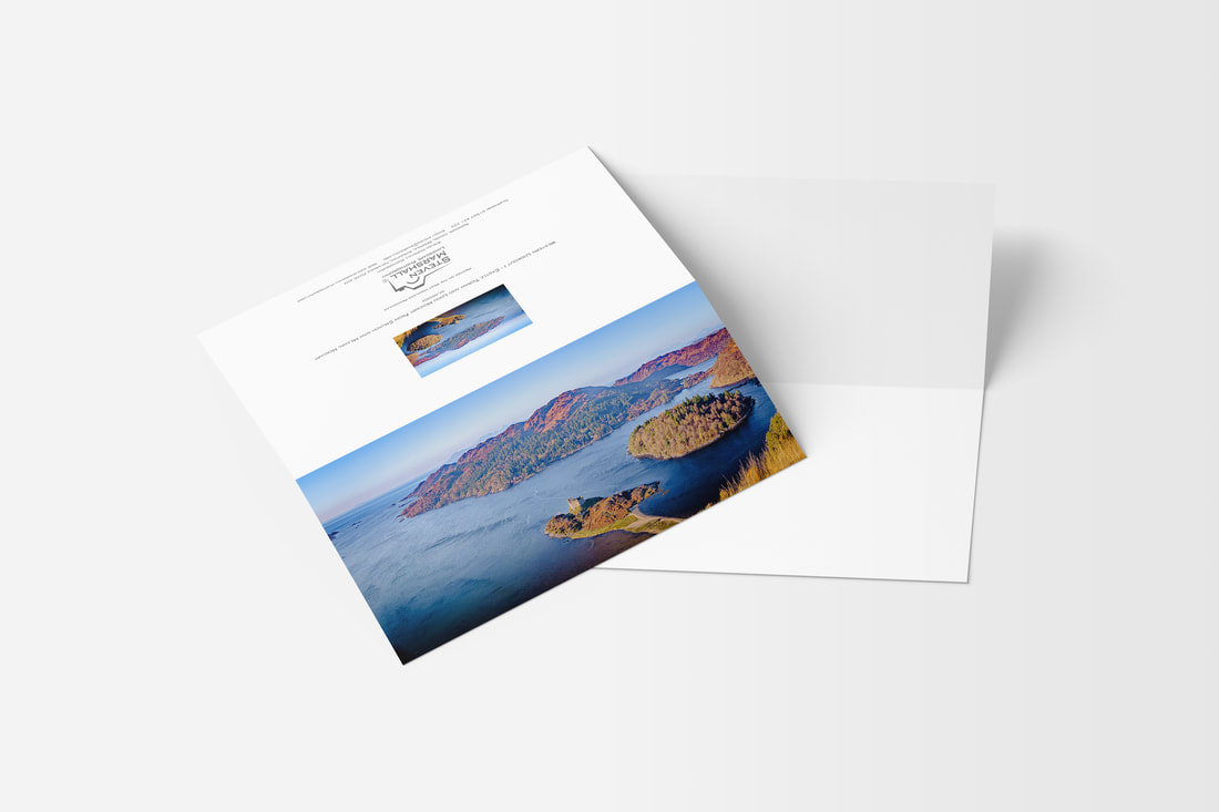 A DL sized greeting card featuring the view northwest from Cruach nam Meann, over Castle Tioram, across Eilean Shona to the Small Isles | Moidart Scotland