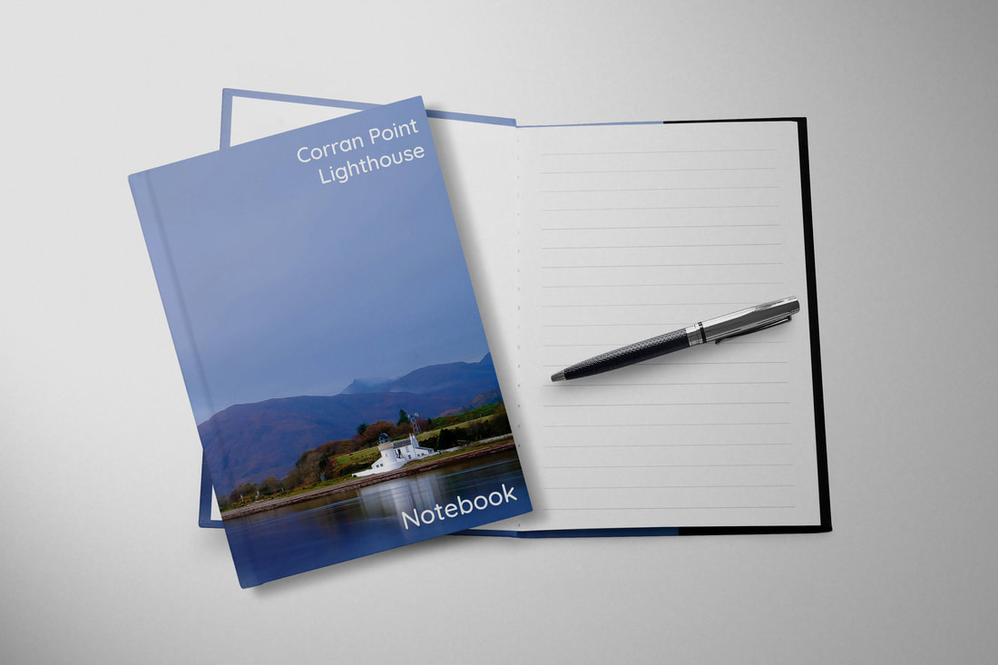 Souvenir hardbacked notebook featuring Corran Point Lighthouse viewed from across a calm Loch Linnhe | Ardgour Scotland