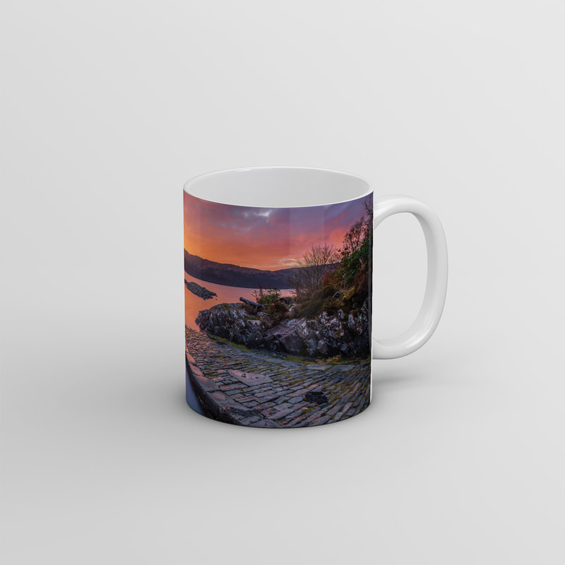 Souvenir photo mug featuring an image of a sunrise on a January Morning with a high tide at the Salen Jetty | Ardnamurchan Scotland