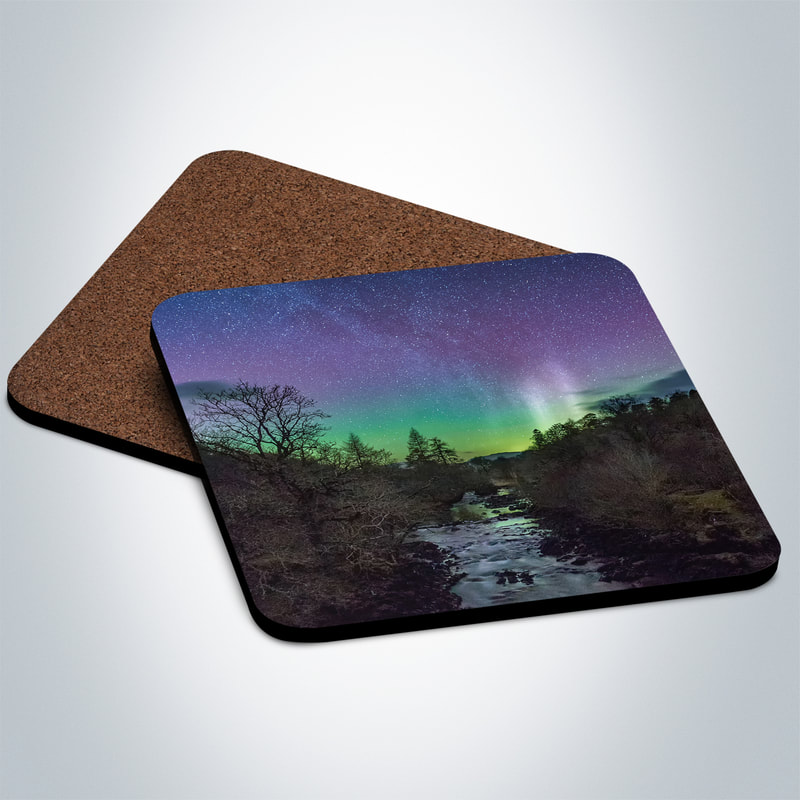 Souvenir photo coaster featuring an image of the Northern Lights above the old boathouse by the side of Loch Aline on Ardtornish Estate | Morvern Scotland