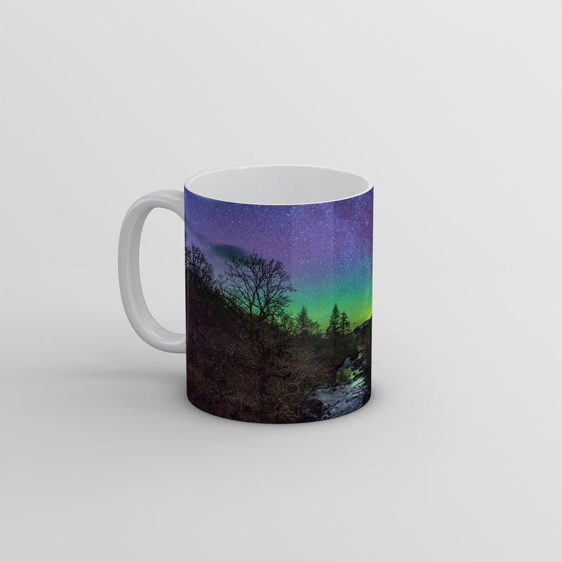 Souvenir photo mug featuring an image of the Northern Lights above the old boathouse by the side of Loch Aline on Ardtornish Estate | Morvern Scotland