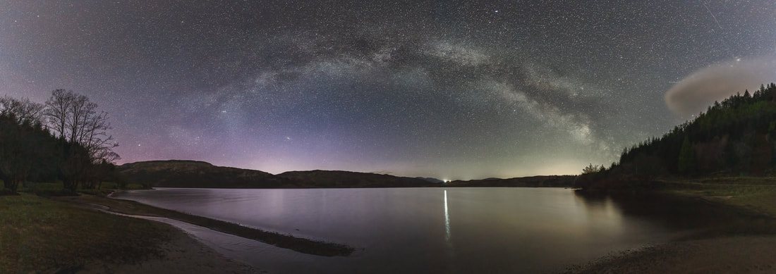 Photographic print of the arch of the Milky Way stretching across Loch Arienas like a star filled. Image of Morvern on the West Highland Peninsulas, Scotland.