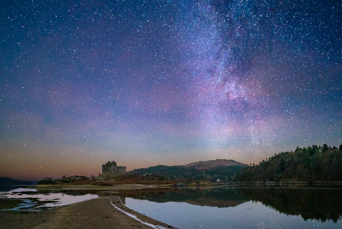 Castle Tioram on Eilean Tioram, cut off by high tide on a clear night in January with the Milky Way and stars above it | Moidart Scotland | Steven Marshall Photography