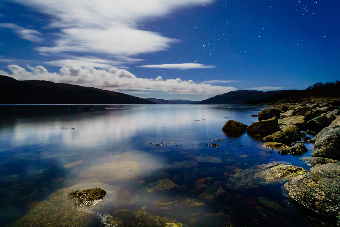Loch Sunart lit by the light of a first quarter moon, with Orion showing above the western horizon | Sunart Scotland