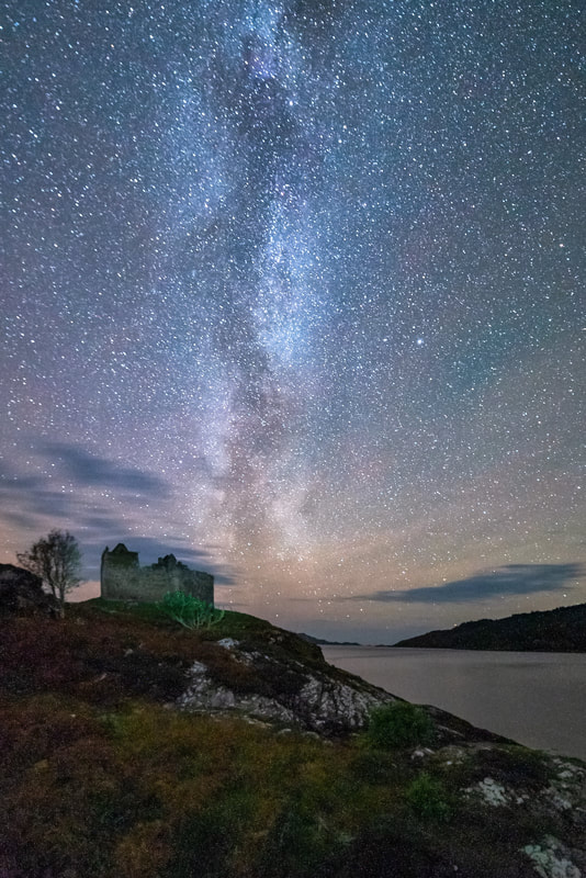 The Milky Way soaring over Castle Tioram and the South Channel of Loch Moidart | Moidart Scotland