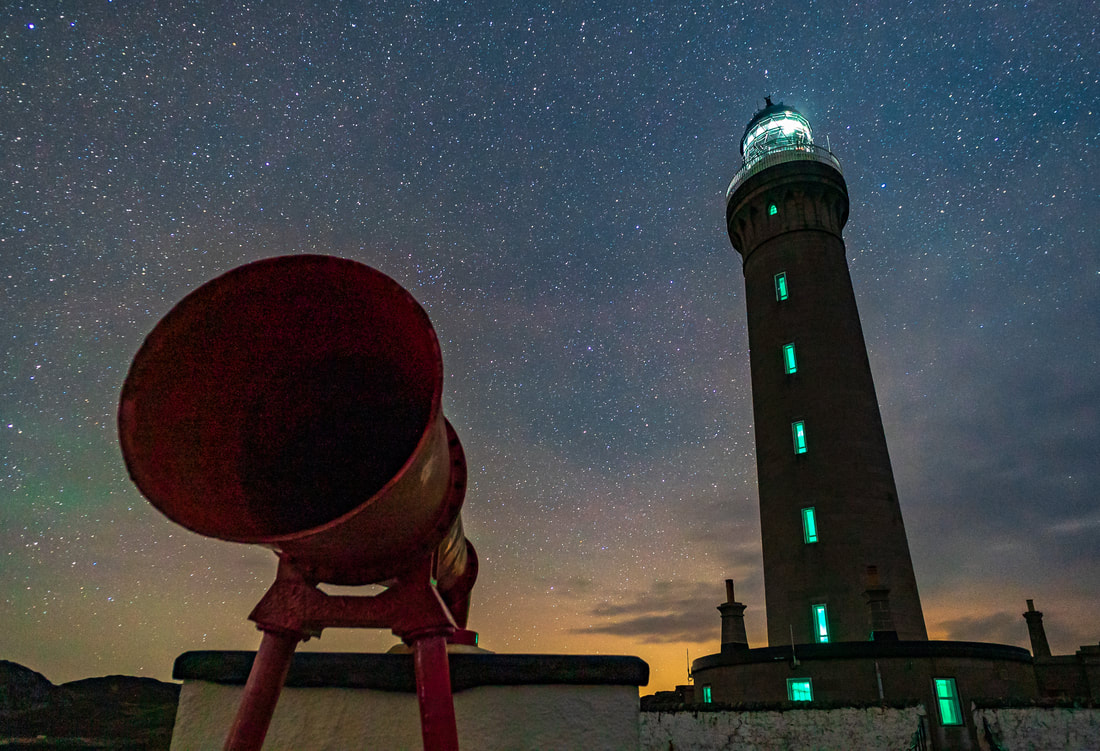 The foghorn and light tower of Ardnamurchan Lighthouse under a starry night sky | Ardnamurchan Scotland