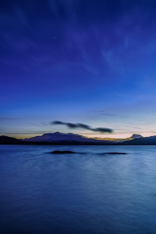 Loch Sunart at twilight with the brightest stars of the night sky twinkling above Ben Resipole | Ardnamurchan Scotland