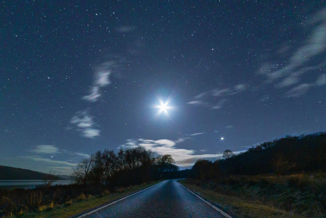 Rays of light bursting from both the Moon and Venus above the road from Resipole to Salen | Sunart Scotland